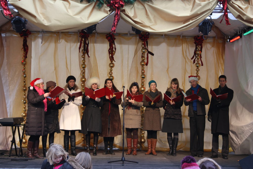 Outdoor holiday carollers.